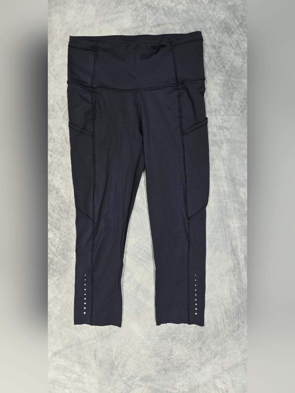 Lululemon Fast & Free Crop II leggings feature side pockets and reflective